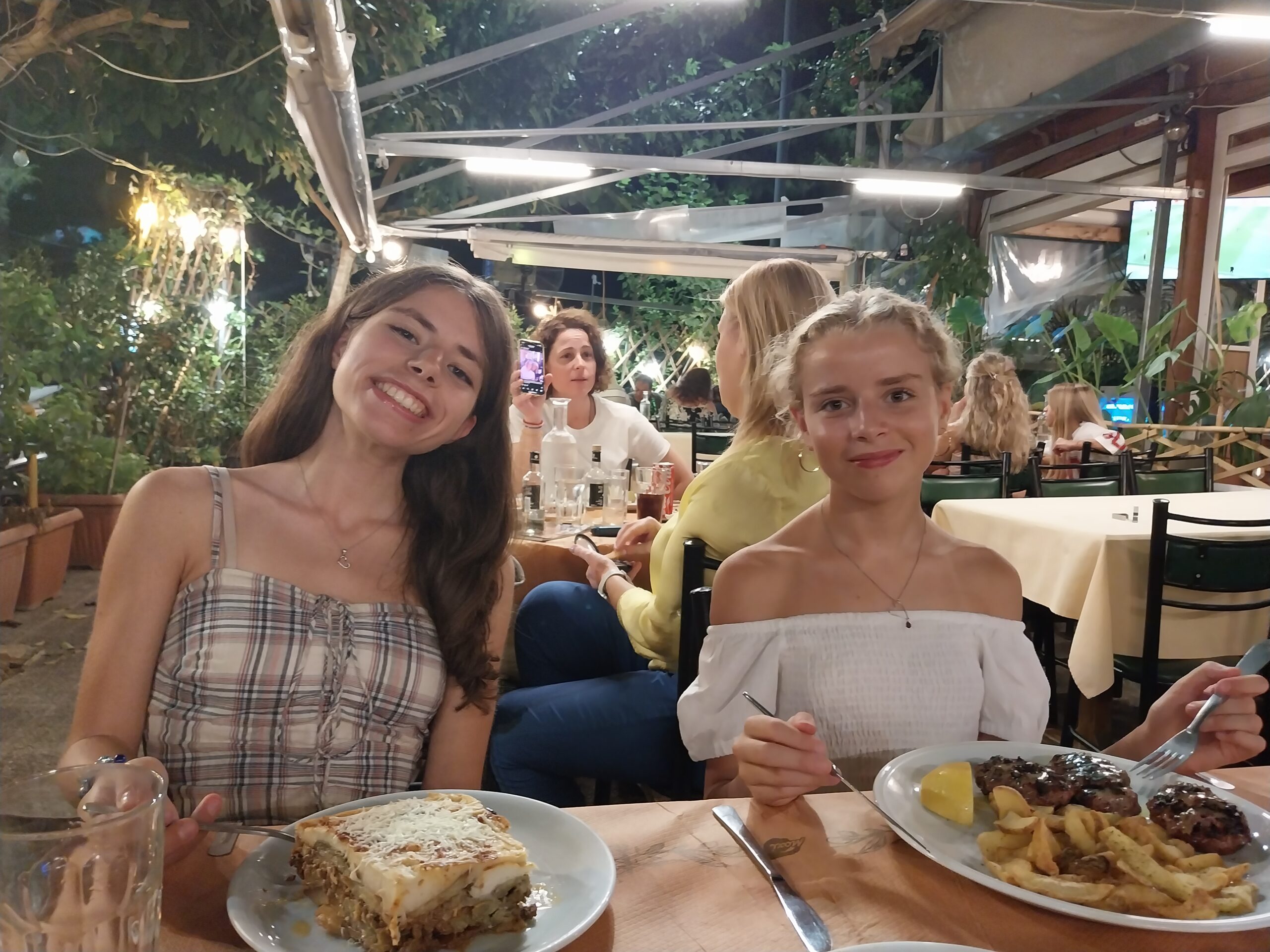 30 + Amazing Things to do in Athens with Teens | Updated for 2025 15 Teens enjoying Greek food