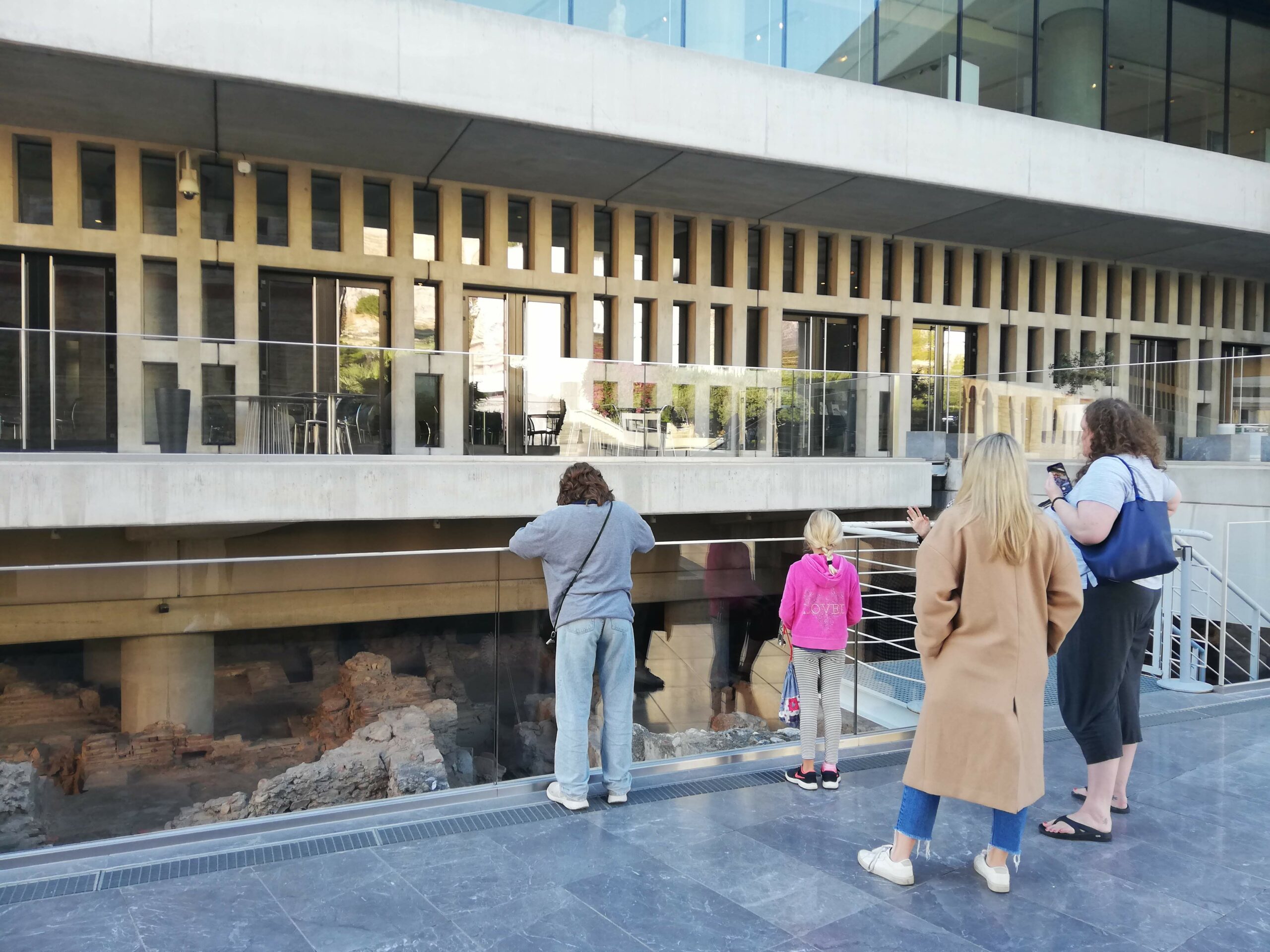 Top things to do in Athens, Greece with children 16 My kids are watching the excavations from above during a private customized Museum Tour